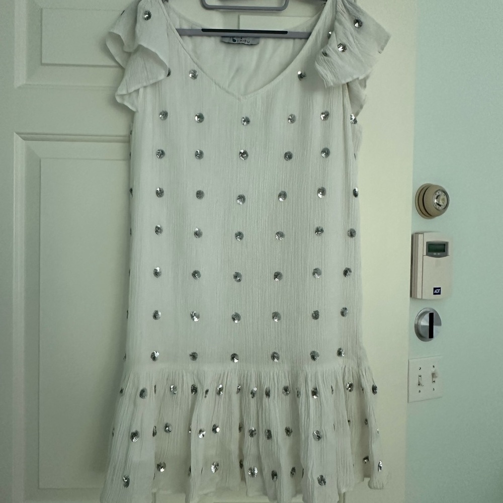 white simmer flowy dress with rhinestone accents.